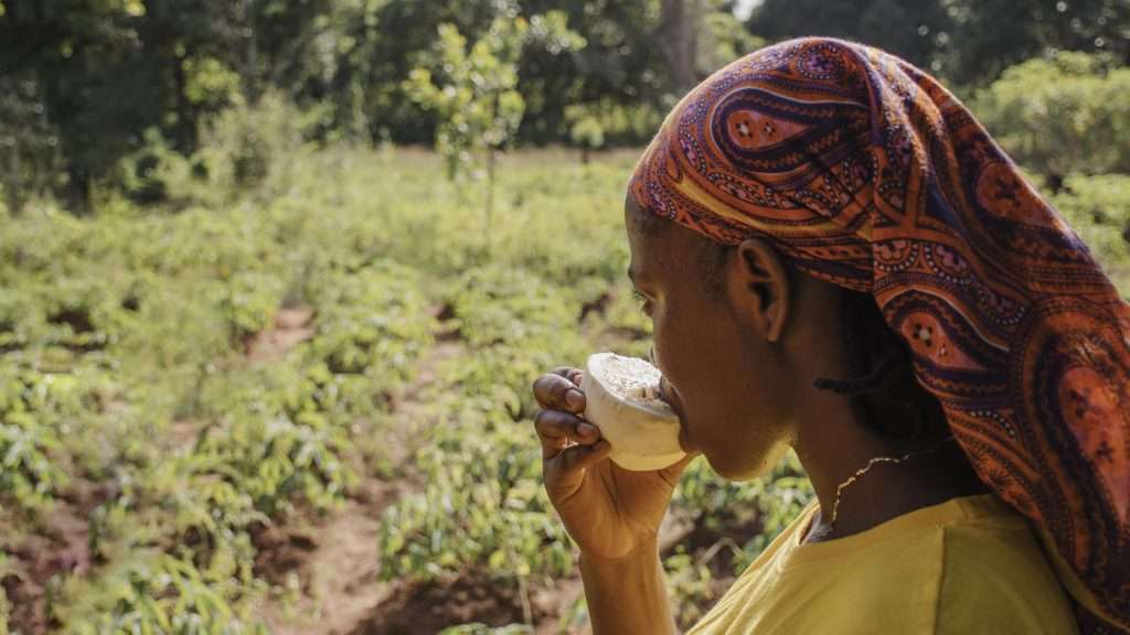 countryside worker enjoying fruit