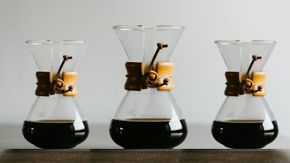 A trio of Chemex coffee makers, showcasing different models